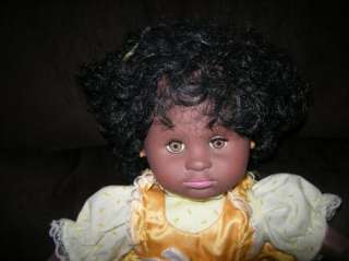 Baby doll from 1980s by Eugene Black curly hair cutie  