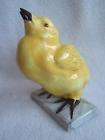 pottery yellow bird figurine  