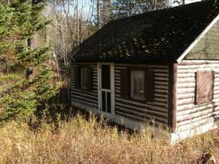 Rustic Log Cabin Home located on Beautiful Thunder Bay River w/ View 
