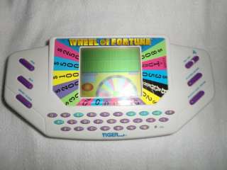 1995 TIGER WHEEL OF FORTUNE GAME SHOW VIDEO HANDHELD GAME WORKS  