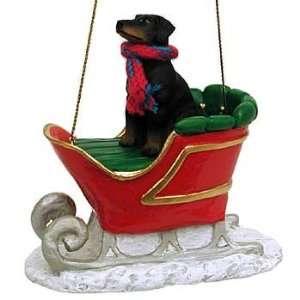  Black Uncropped Dobie in a Sleigh Christmas Ornament