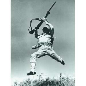  Soldier Jumping With Rifle, Low Angle View Photographic 