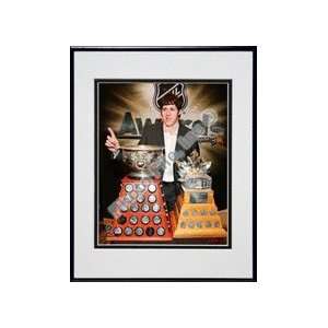 com Evgeni Malkin with the Art Ross Trophy and the Conn Smythe Trophy 