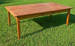 Dining room Harvest table by Maine Cabinet makers  