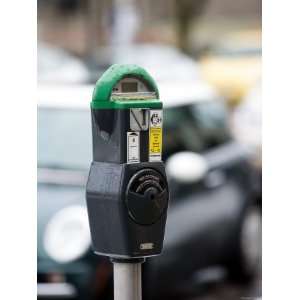  Selective Focus of Wet Parking Meter in City Stretched 