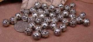 Twenty Antique Vintage style Silver colored Rose beads. About 8mm 