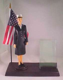 standing tall on a 9 x 4 base add a picture of your marine officer 