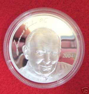 The Papal side of this beautiful mint sterling silver proof coin shows 