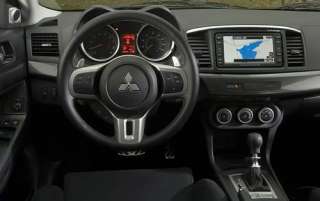 The 2 pictures below are from a 2011 lancer with factory navigation 