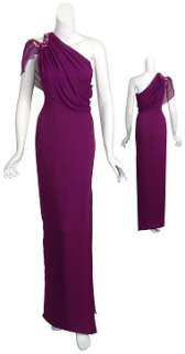 Statuesque silk evening gown. One shoulder neckline adorned with 