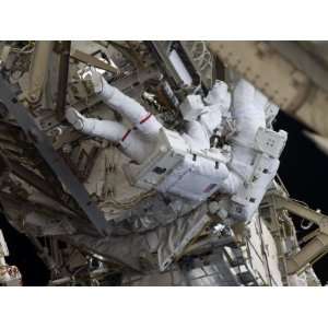 Astronaut Participates in Extravehicular Activity on the International 