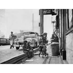 Tricycle Riders   Circa 1950 