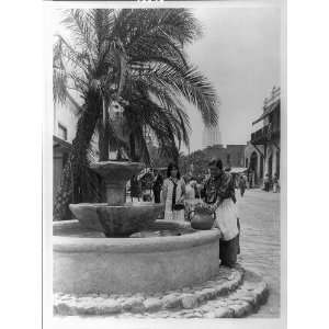   water,fountain,Olvera Street,Mexican shopping,CA,1910