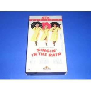 Singing in the Rain and the Santa Clause (2 Vhs Tapes 