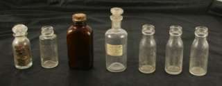 Lot of 7 Vintage Jars Thomas Edison Battery Oil Amber Clear Glass 