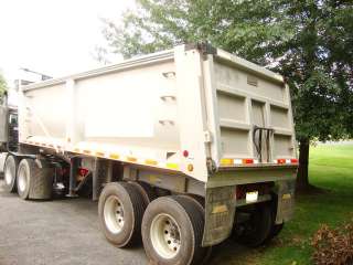 used dump trailers for sale  tri axle end dump used  Rhodes Trailers 