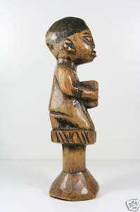 old wooden African statue, kneeling figure Zaire, Congo  