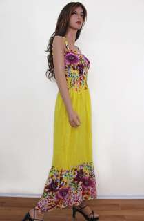 Colorful maxi sundress that features smocked bust line, elastic 