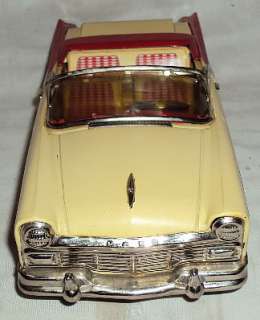   1956 MODEL CAR FORD FAIRLANE CONVERTIBLE RED & WHITE TOY CAR