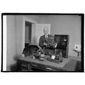  Photo Thomas E. Robertson, Com. of Patents with old models 