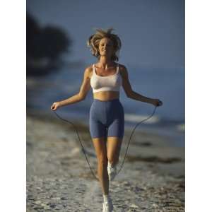    Woman Jumping Rope on the Beach Giclee Poster Print