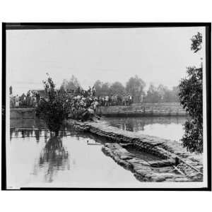  Levee created by sandbags, workers gathered, 1927 Flood 
