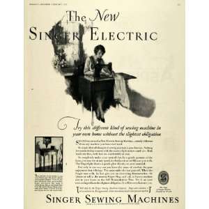 1928 Ad Singer Electric Sewing Machines Library Table   Original Print 